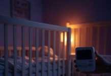 Understanding Infant Sleep Cycles: What Every Parent Needs to Know Crib, lopsided blanket, flickering nightlight, clutching monitor, mismatched socks.